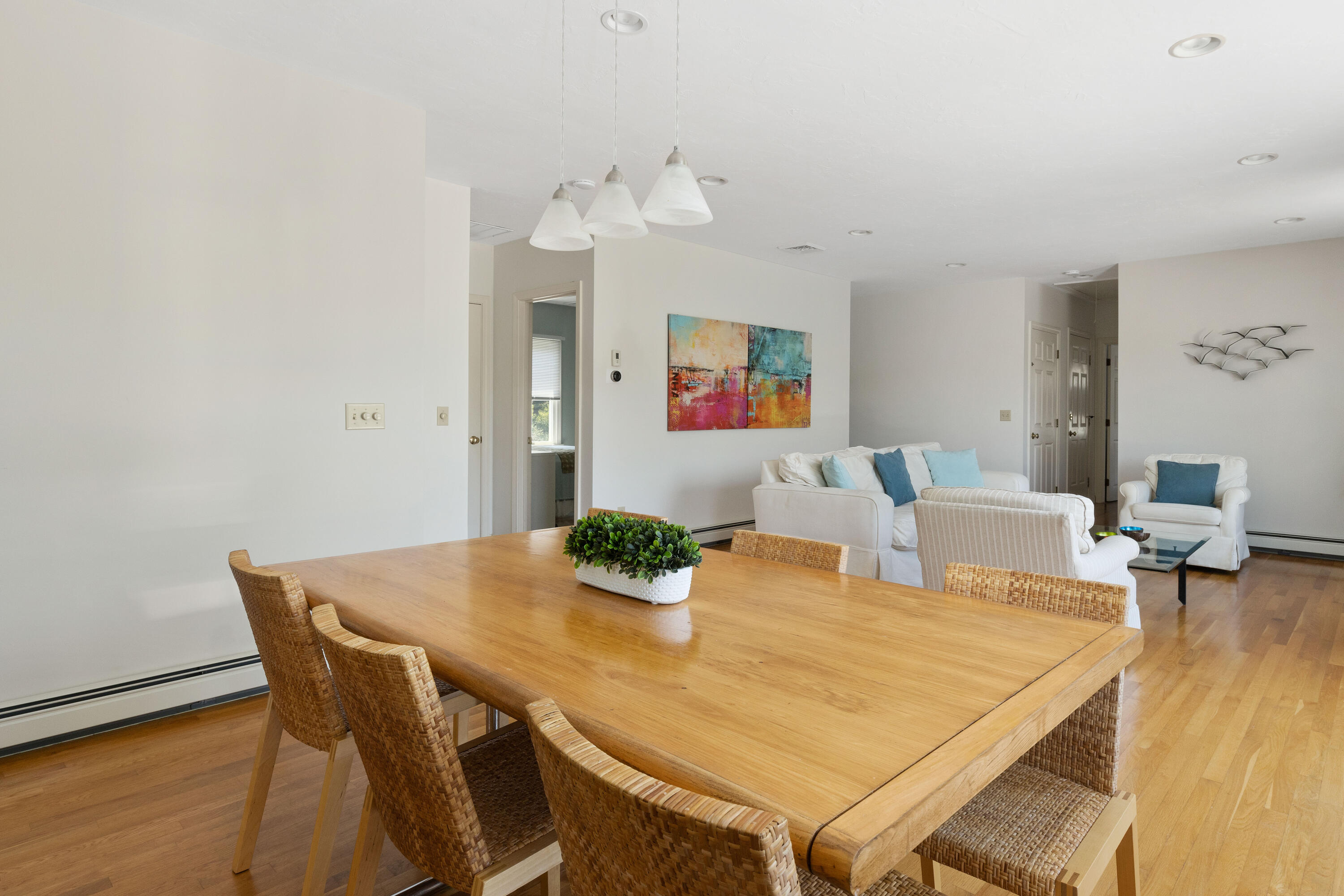 5 Starbuck Road Truro, MA 02666 - Photo 21 of 46 a view of a dining room with furniture and wooden floor