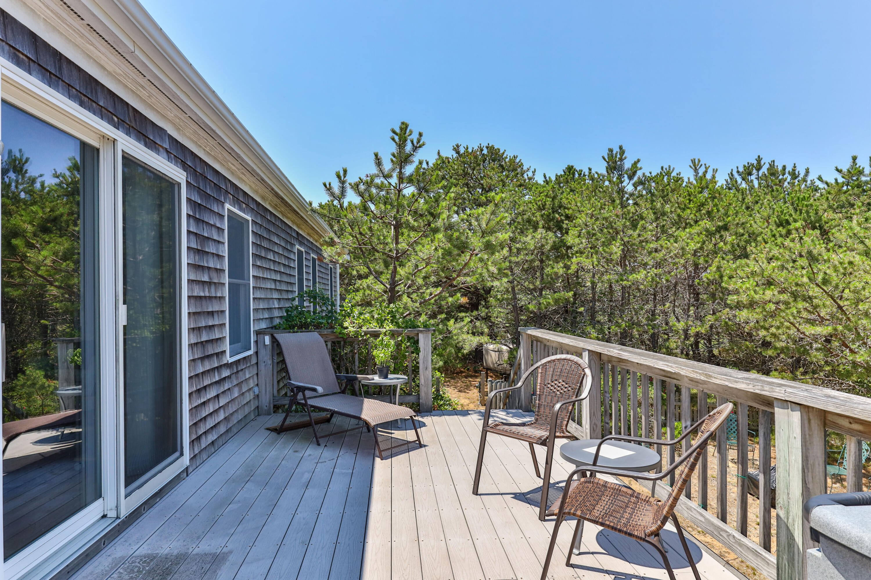 5 Starbuck Road Truro, MA 02666 - Photo 41 of 46 a view of a balcony with furniture and wooden floor