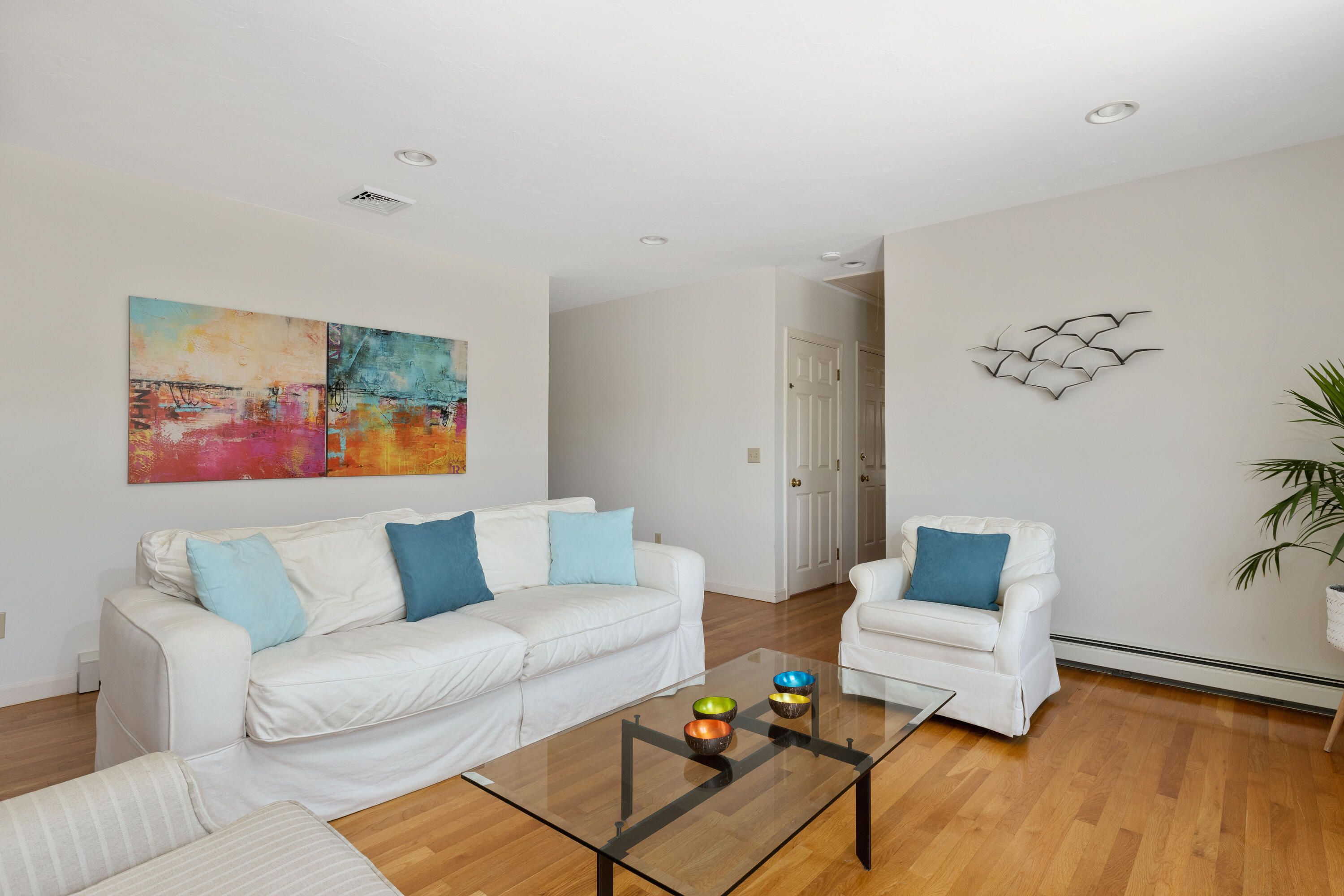 5 Starbuck Road Truro, MA 02666 - Photo 10 of 46 a living room with furniture and wooden floor