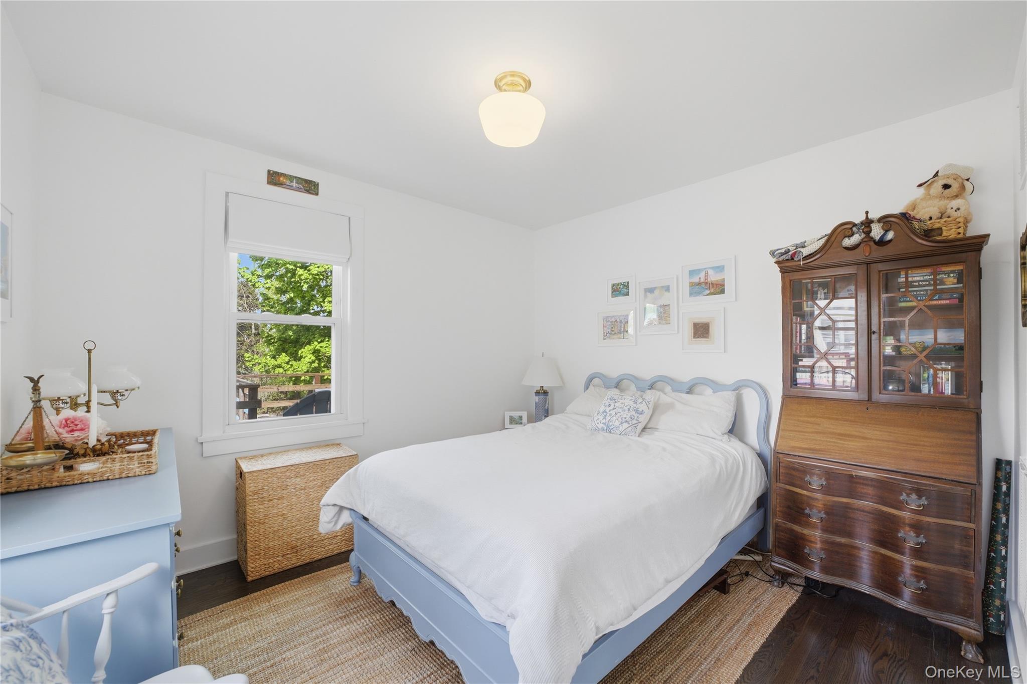 318 Union Avenue Peekskill, NY 10566 - Photo 12 of 30 a bedroom with a bed and a window
