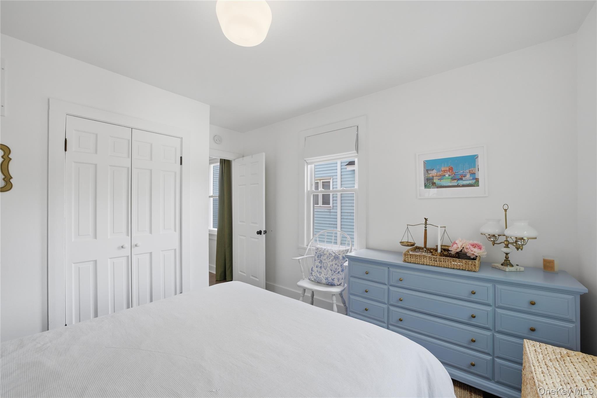 318 Union Avenue Peekskill, NY 10566 - Photo 13 of 30 a bedroom with a bed and a dresser