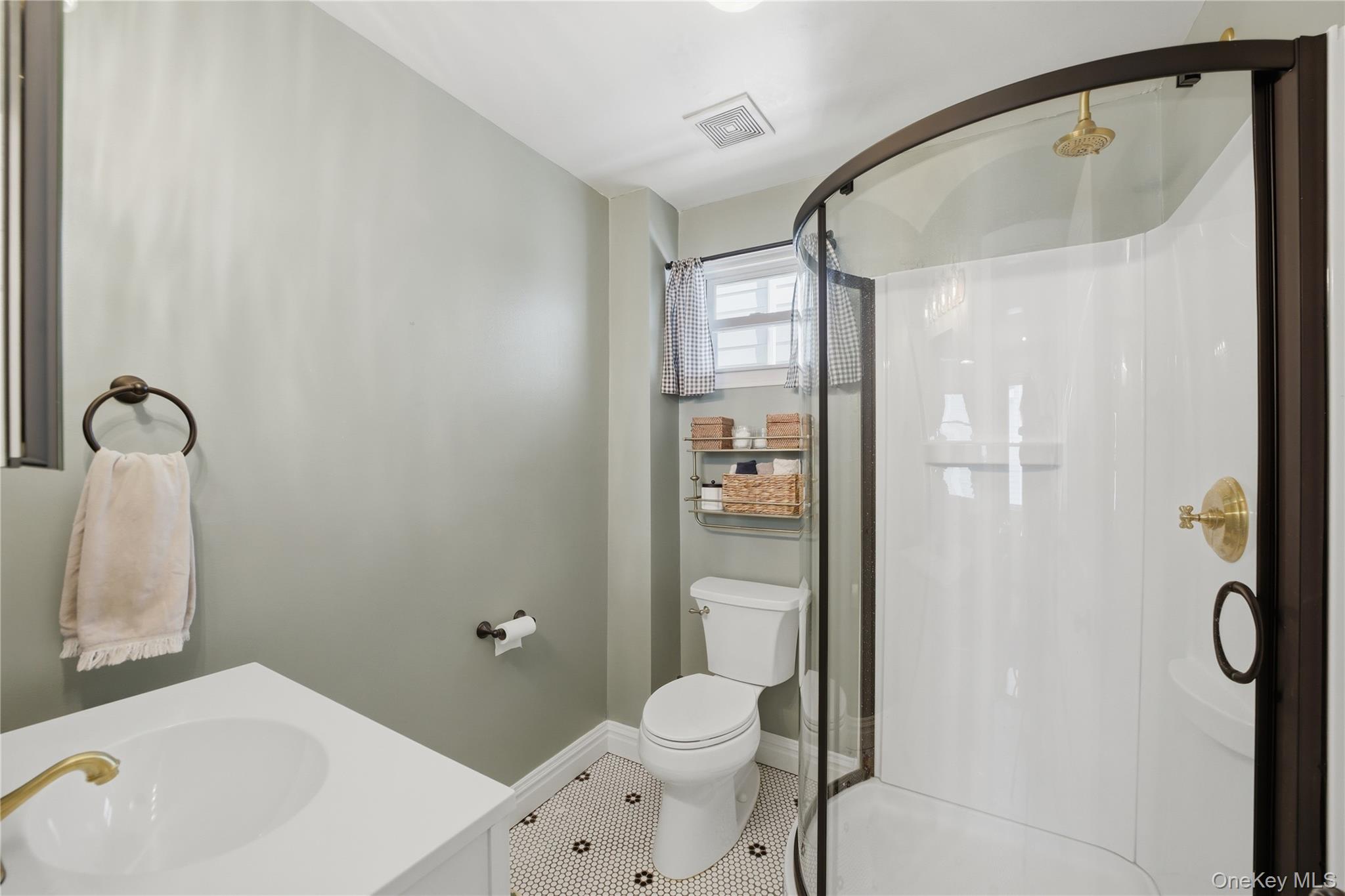 318 Union Avenue Peekskill, NY 10566 - Photo 14 of 30 a bathroom with a sink toilet and shower