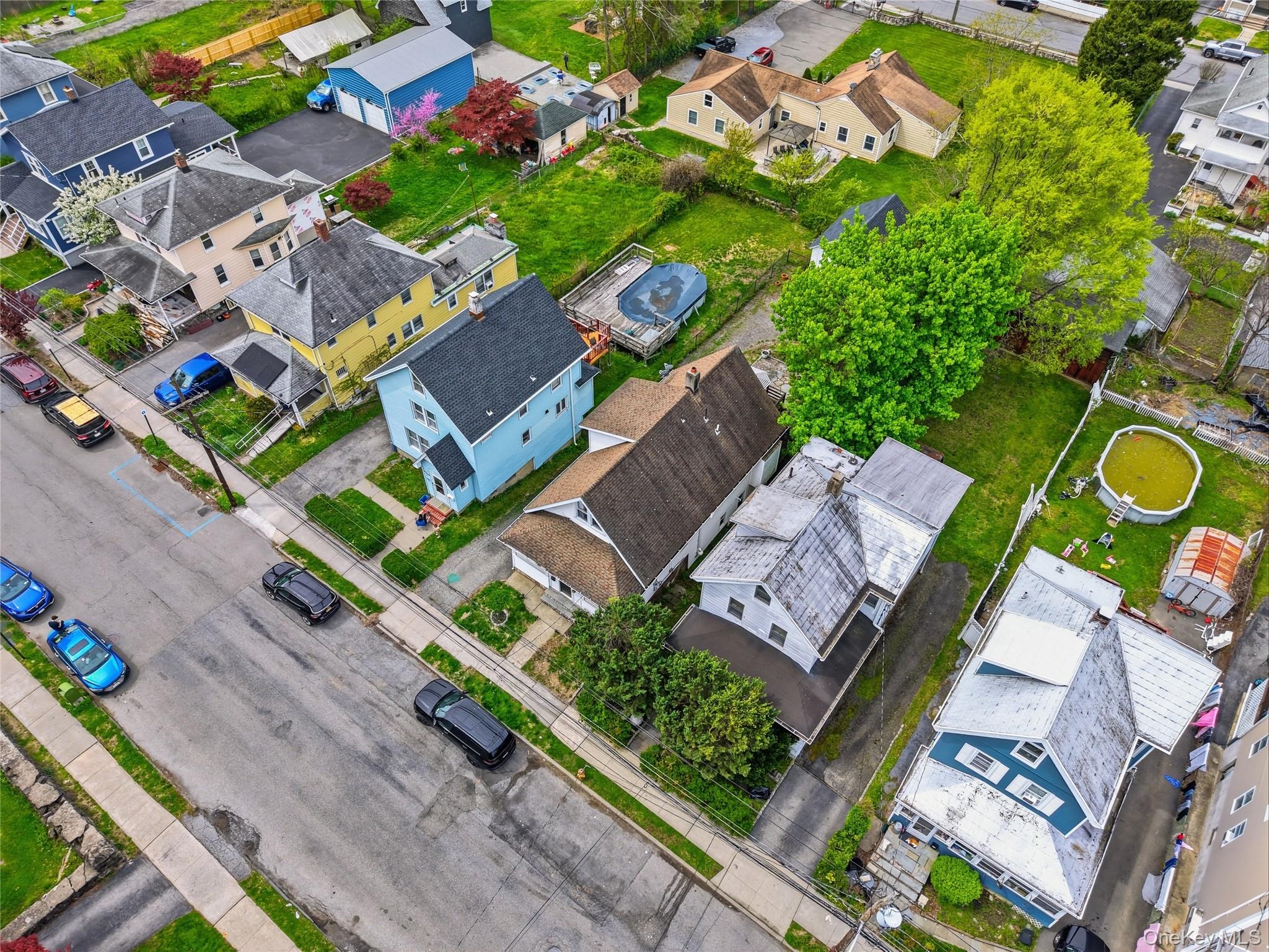 318 Union Avenue Peekskill, NY 10566 - Photo 2 of 30 an aerial view of a house with a garden