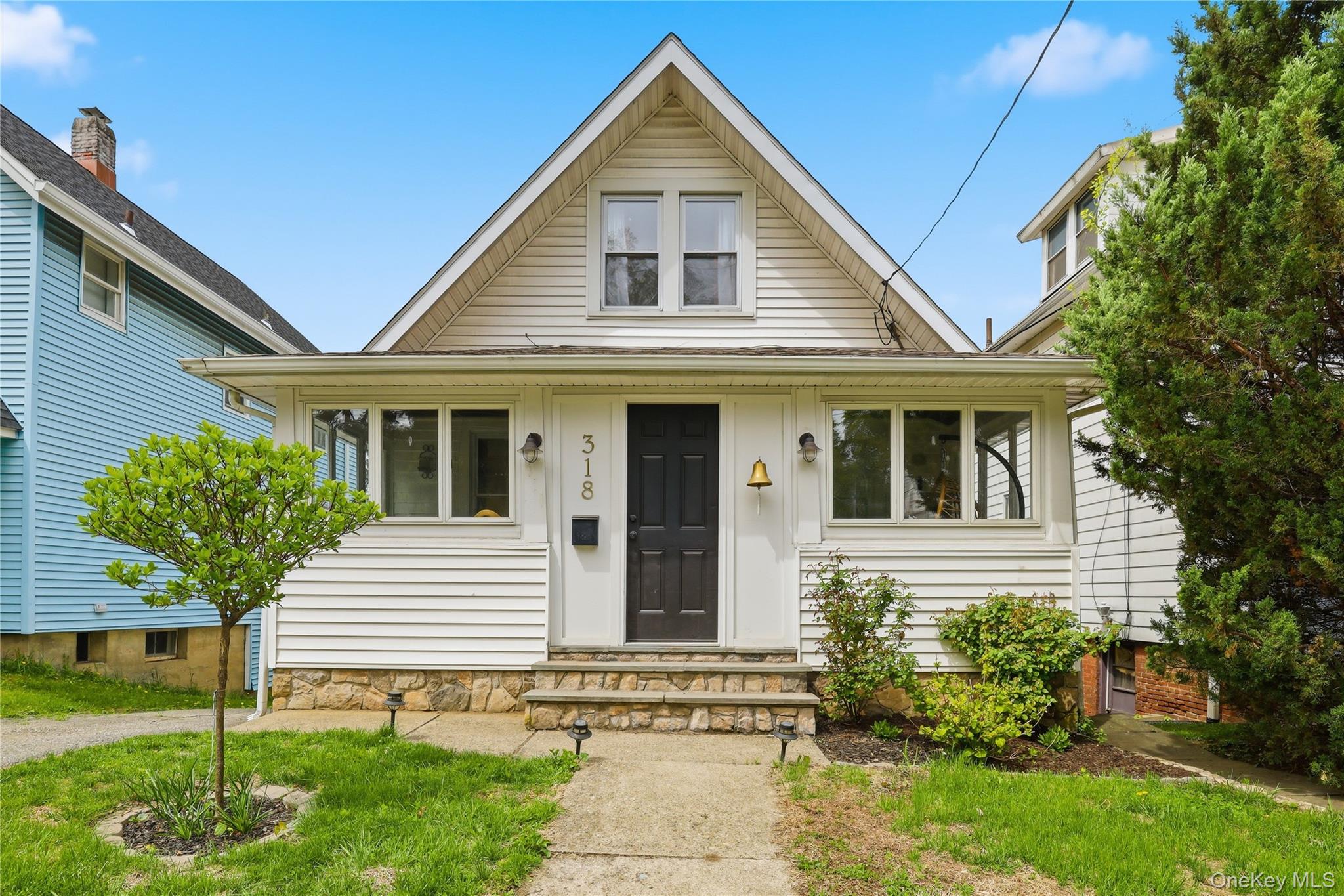 318 Union Avenue Peekskill, NY 10566 - Photo 28 of 30 a front view of a house with garden