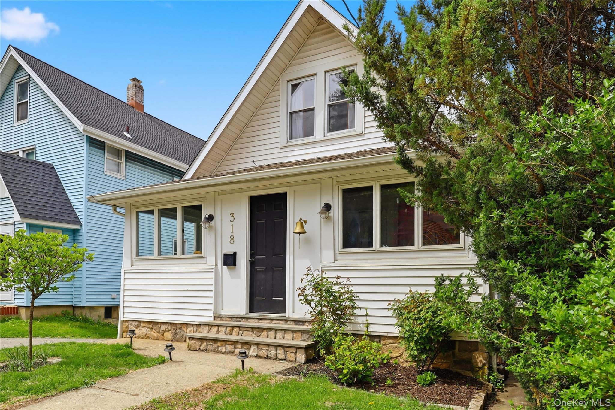 318 Union Avenue Peekskill, NY 10566 - Photo 29 of 30 front view of a house with a yard