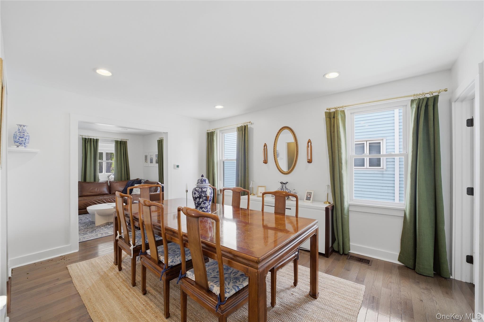 318 Union Avenue Peekskill, NY 10566 - Photo 9 of 30 a dining room with furniture a rug and wooden floor