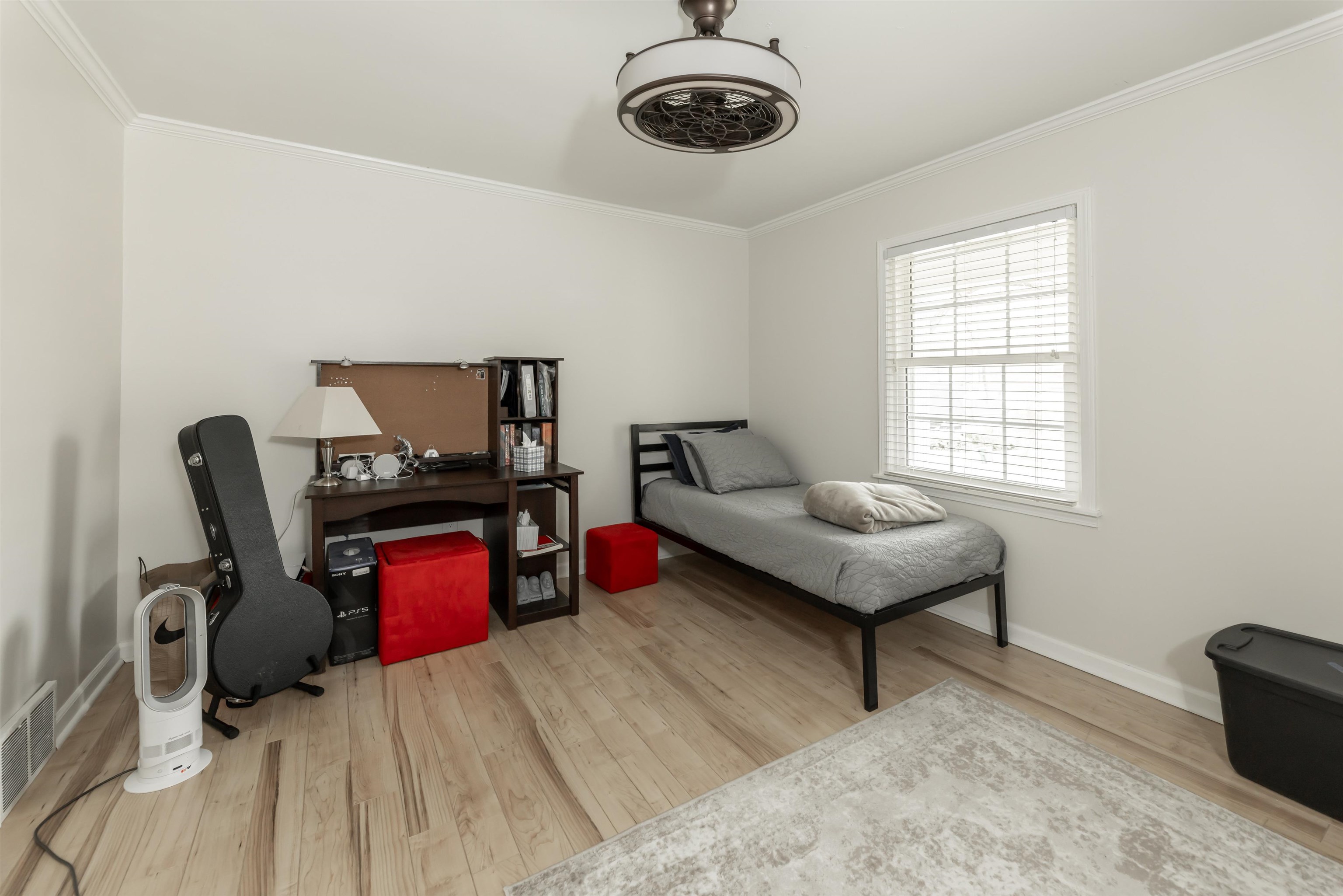 8441 Dogwood Road Germantown, TN 38139 - Photo 23 of 29 Bedroom with crown molding and light wood-style flooring
