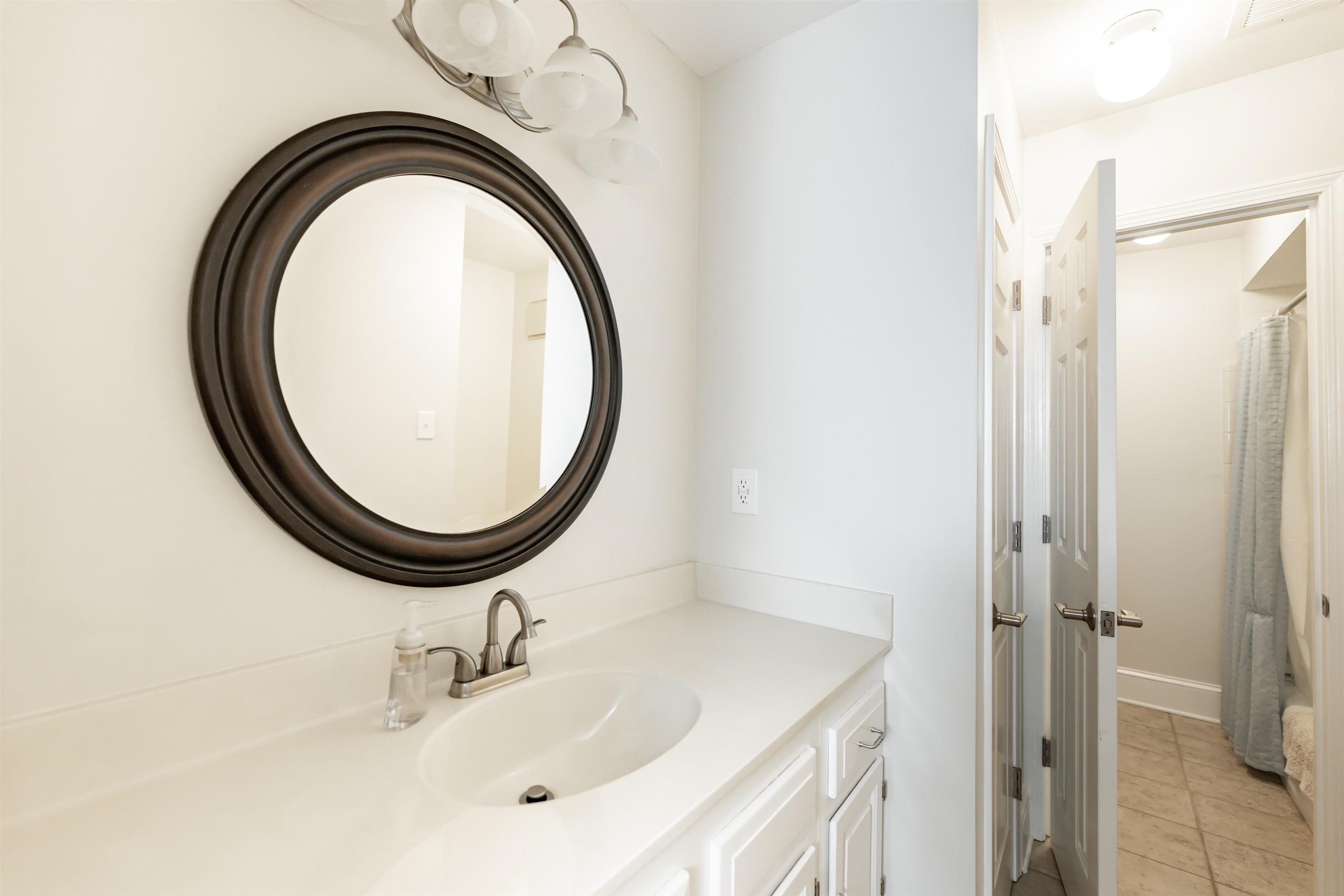 8441 Dogwood Road Germantown, TN 38139 - Photo 26 of 29 Bathroom with vanity and light tile patterned flooring