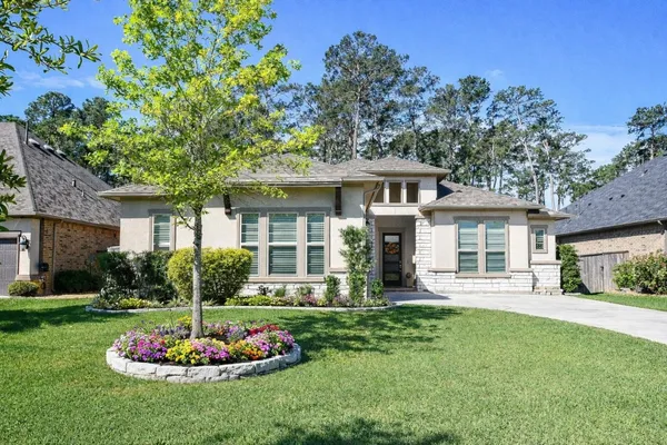 $625,000 | 604 Castlewood Cove Lane, Pinehurst, TX 77362