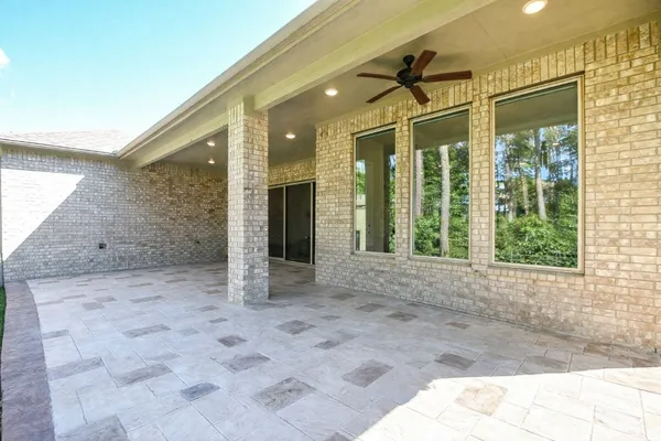 $625,000 | 604 Castlewood Cove Lane, Pinehurst, TX 77362