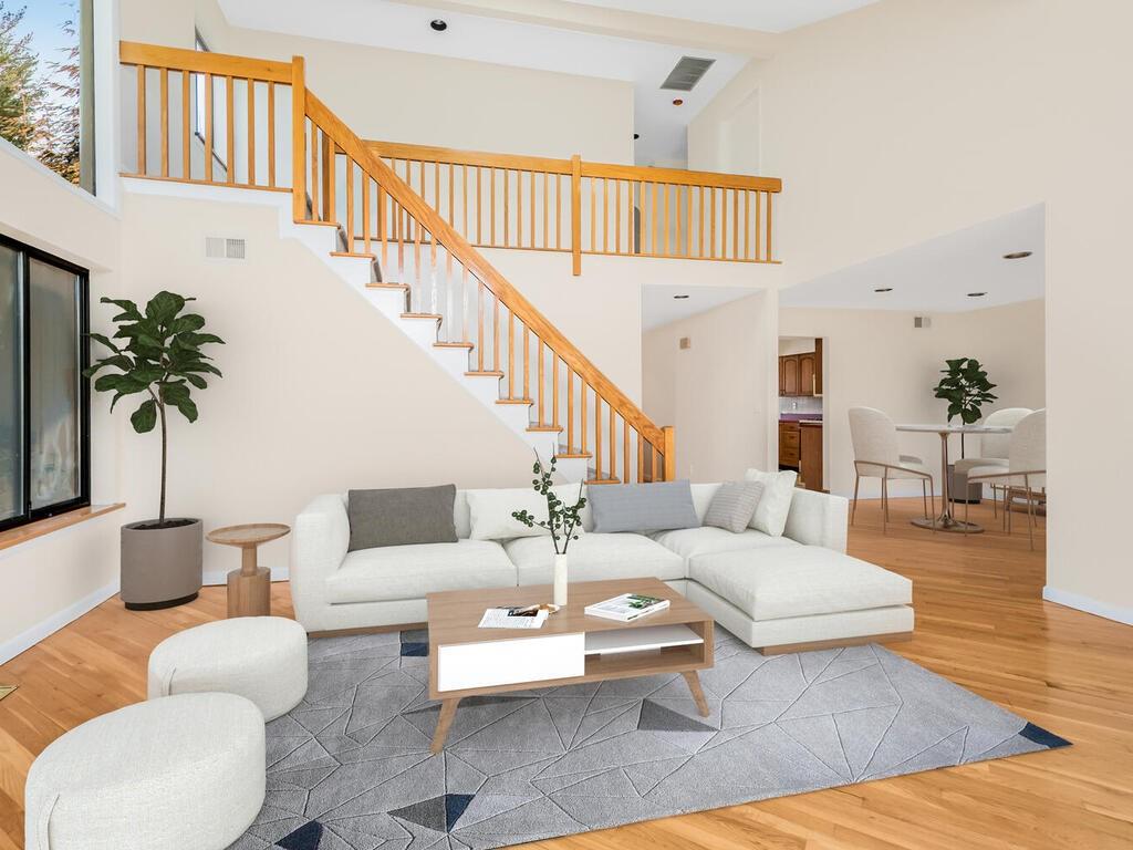 200 California Road, Unit 28 Mount Vernon, NY 10552 - Photo 1 of 1 a living room with furniture and a couch