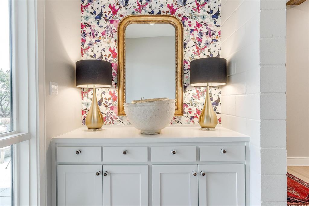 357 Wood Lake Road Aledo, TX 76008 - Photo 12 of 40 a bathroom with a sink and a mirror