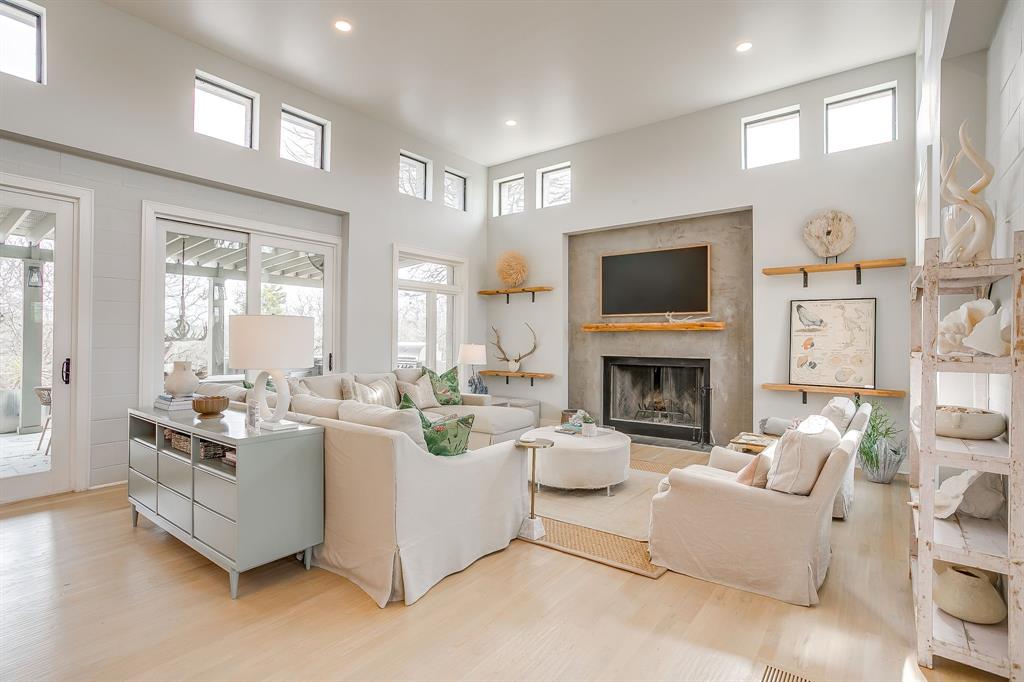 357 Wood Lake Road Aledo, TX 76008 - Photo 13 of 40 a living room with furniture fireplace and a large window