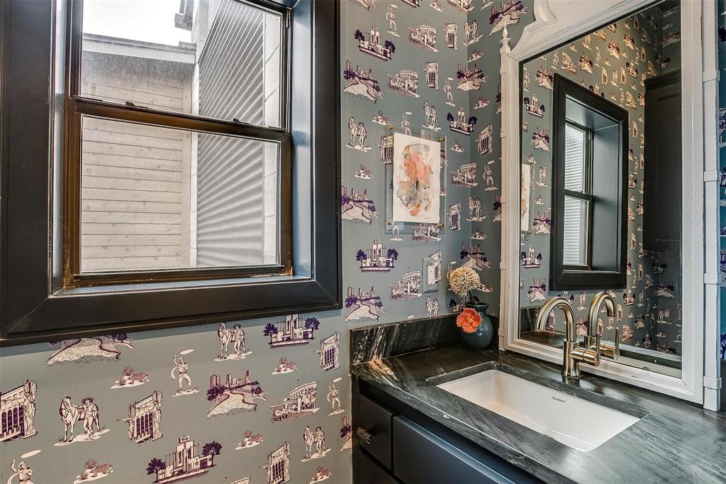 357 Wood Lake Road Aledo, TX 76008 - Photo 21 of 40 a bathroom with a granite countertop sink and a mirror