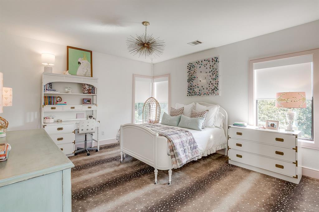 357 Wood Lake Road Aledo, TX 76008 - Photo 26 of 40 a spacious bedroom with a bed and a window
