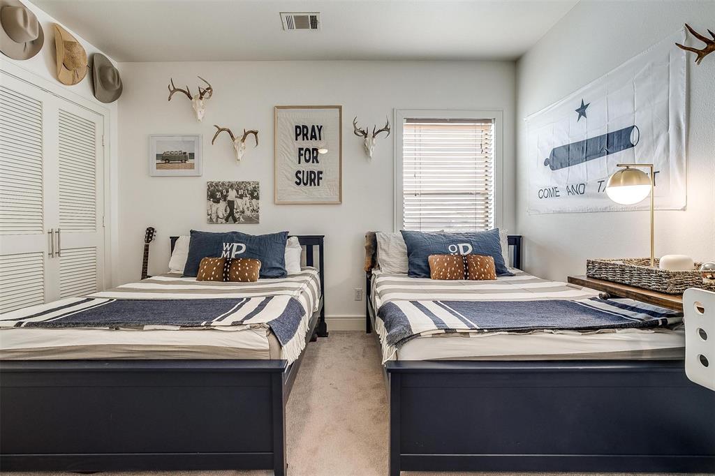 357 Wood Lake Road Aledo, TX 76008 - Photo 27 of 40 a bedroom with bed and window