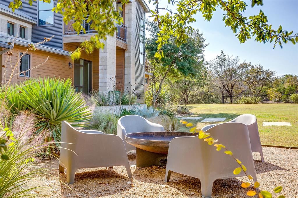 357 Wood Lake Road Aledo, TX 76008 - Photo 9 of 40 a view of a swimming pool with a patio