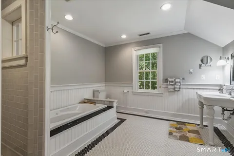 a bathroom with a sink and a bathtub