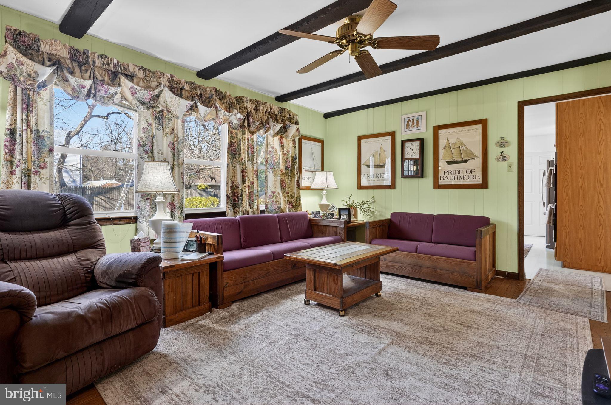 1725 Tarrytown Avenue Crofton, MD 21114 - Photo 21 of 39 a living room with furniture and a window