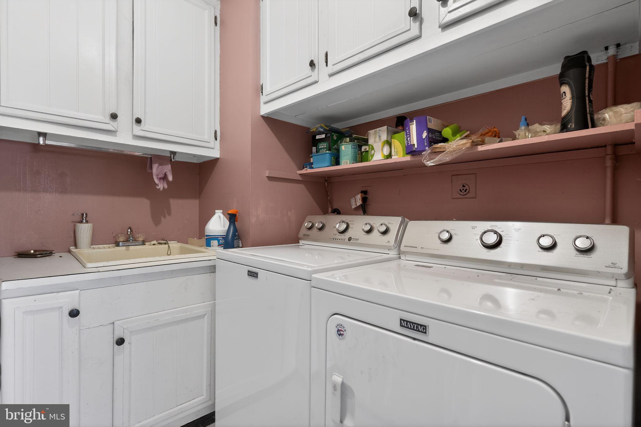 1725 Tarrytown Avenue Crofton, MD 21114 - Photo 22 of 39 a utility room with dryer and washer