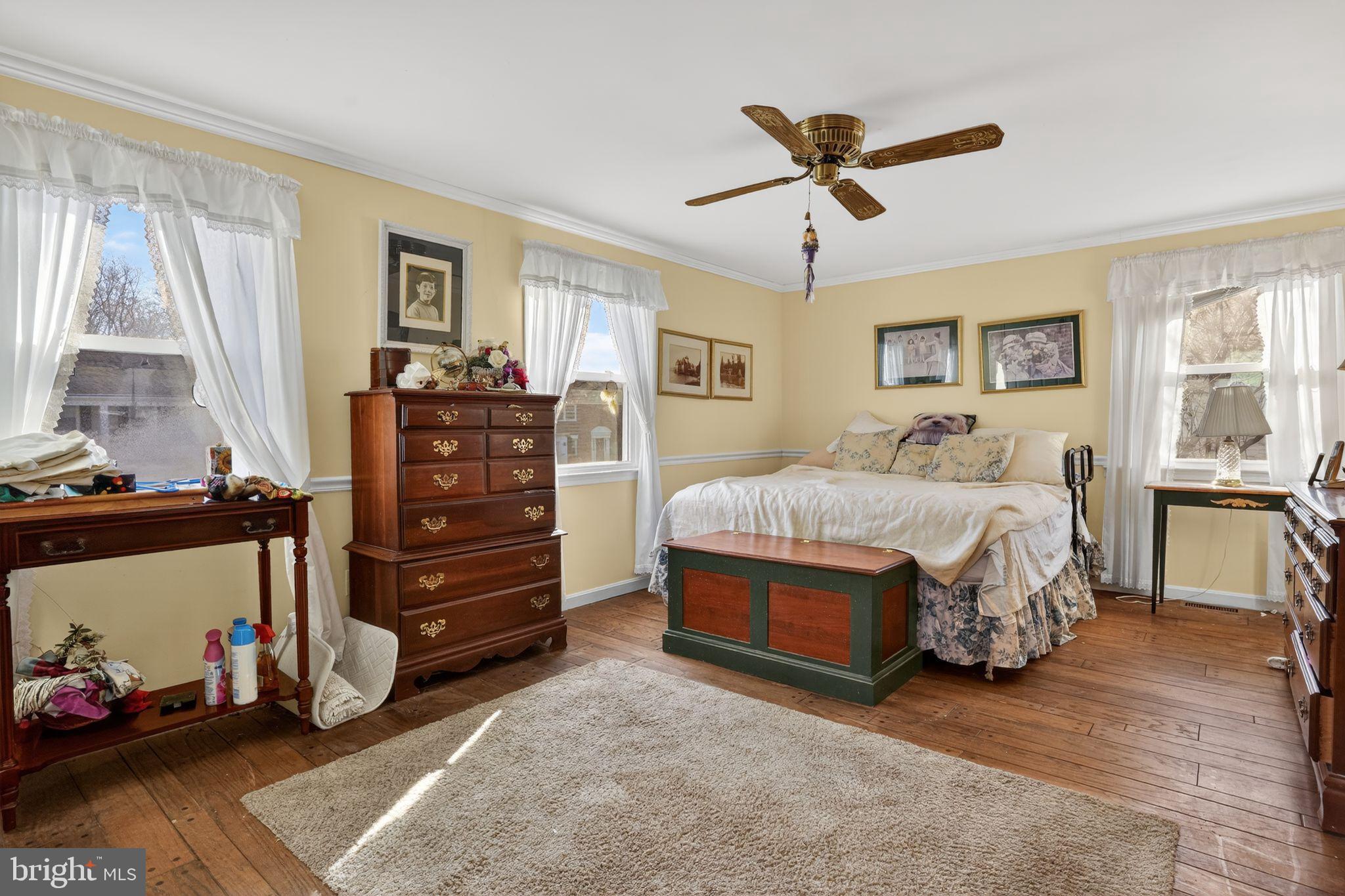 1725 Tarrytown Avenue Crofton, MD 21114 - Photo 24 of 39 a bedroom with a bed and a window