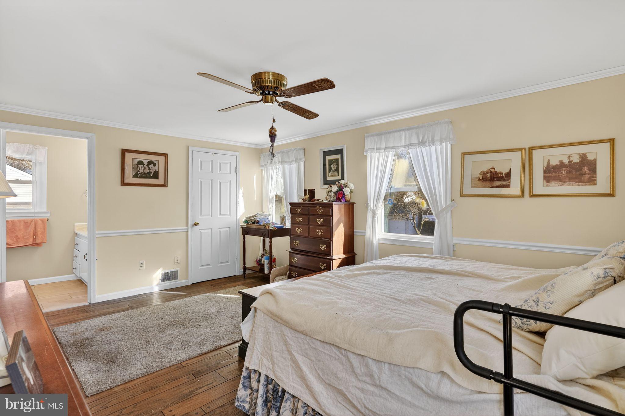 1725 Tarrytown Avenue Crofton, MD 21114 - Photo 25 of 39 a bed room with a bed and furniture
