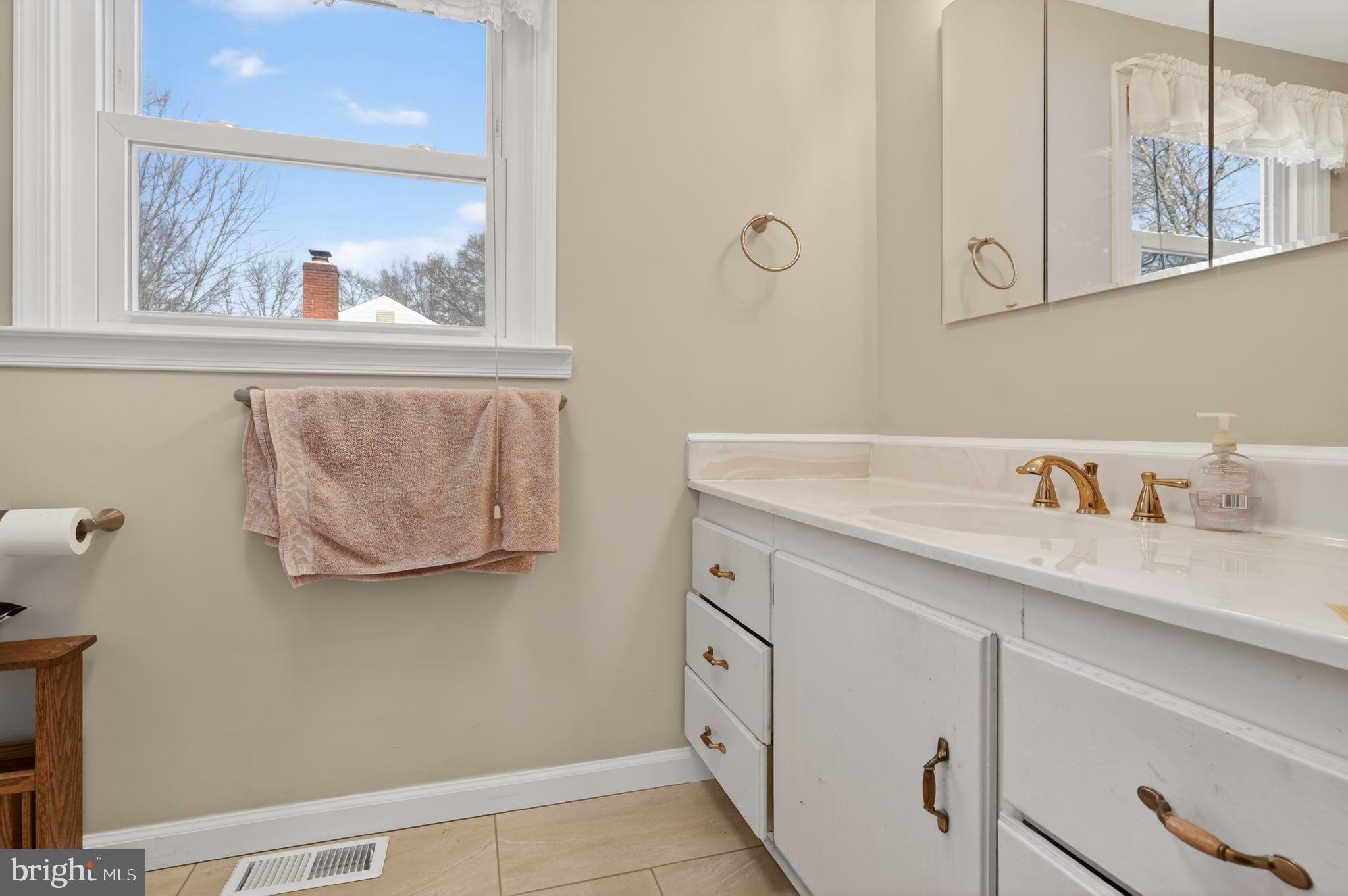 1725 Tarrytown Avenue Crofton, MD 21114 - Photo 26 of 39 a view of cabinets and wooden floor