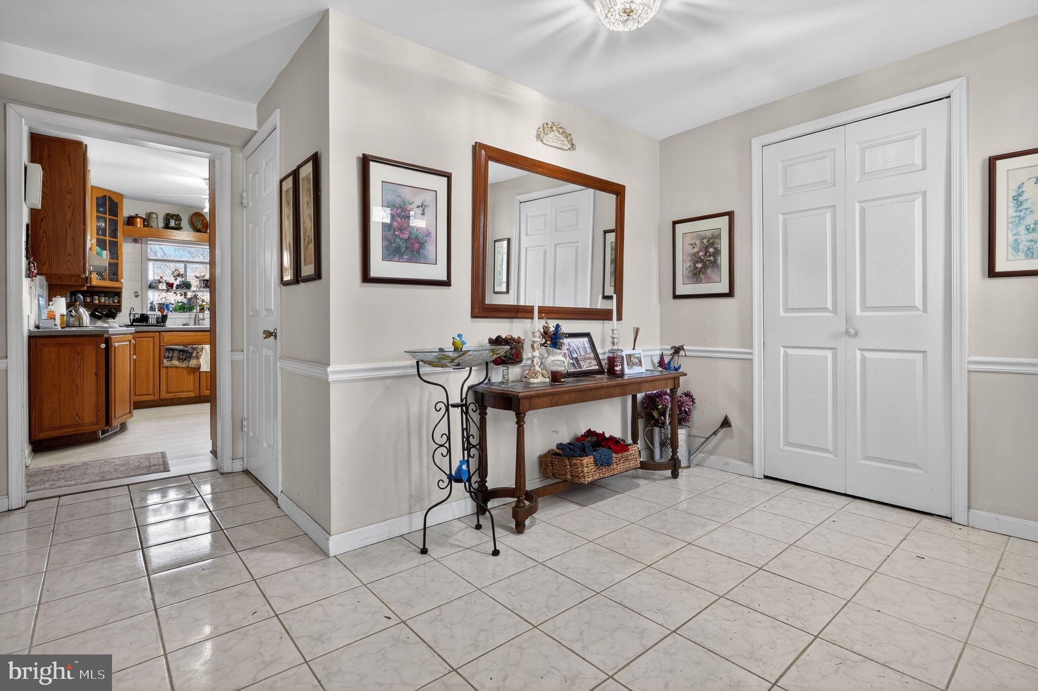 1725 Tarrytown Avenue Crofton, MD 21114 - Photo 5 of 39 a view of a livingroom with workspace and a window