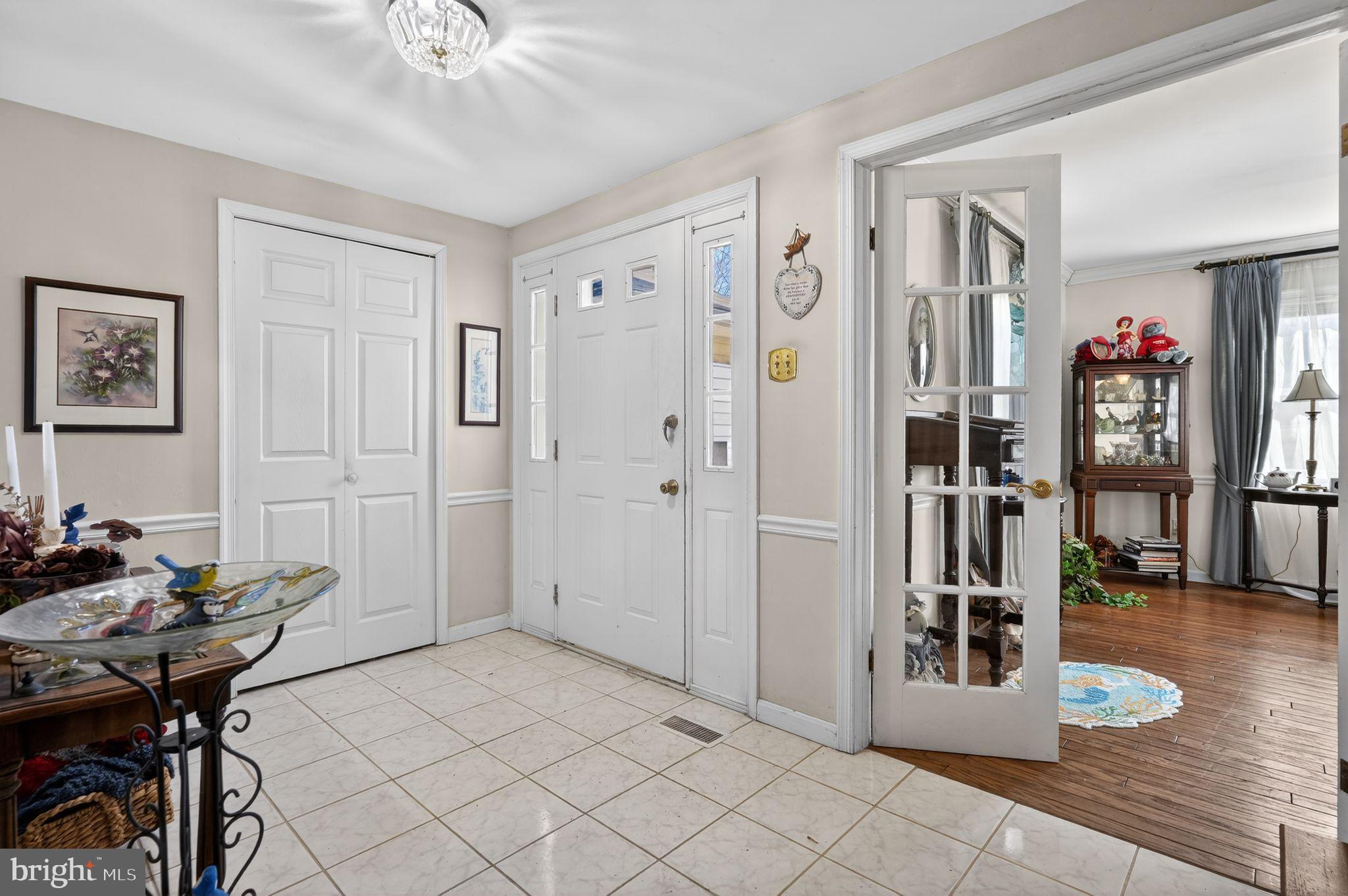 1725 Tarrytown Avenue Crofton, MD 21114 - Photo 6 of 39 a view of a livingroom with furniture and white furniture