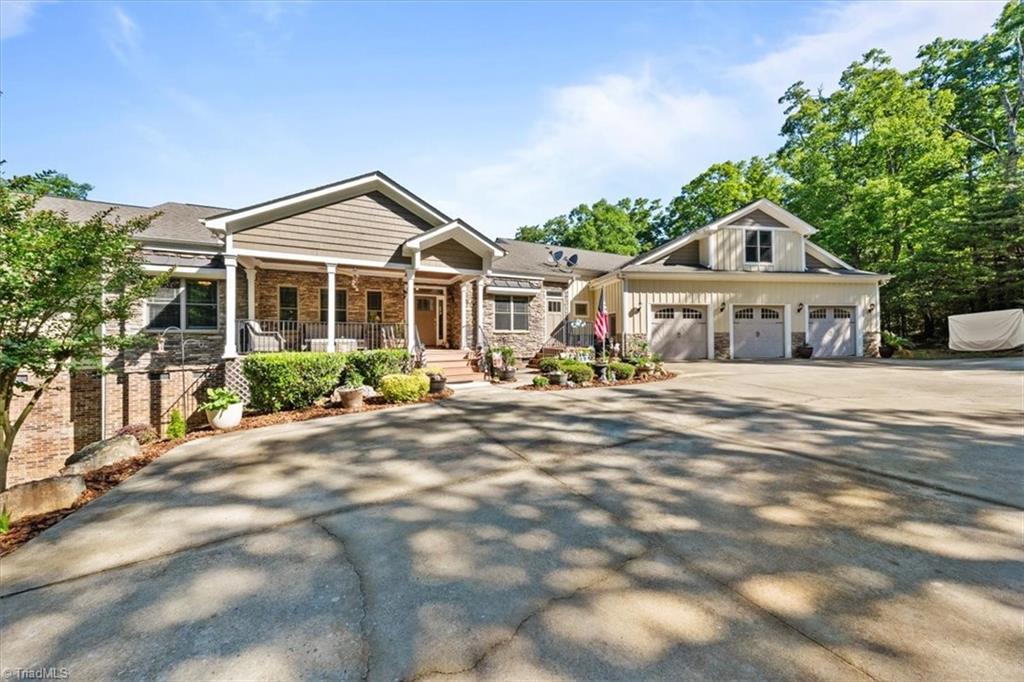 2207 Sierra Trace Road Denton, NC 27239 - Photo 2 of 49 Beautiful custom-built home offering impressive curb appeal and elevated lake community living