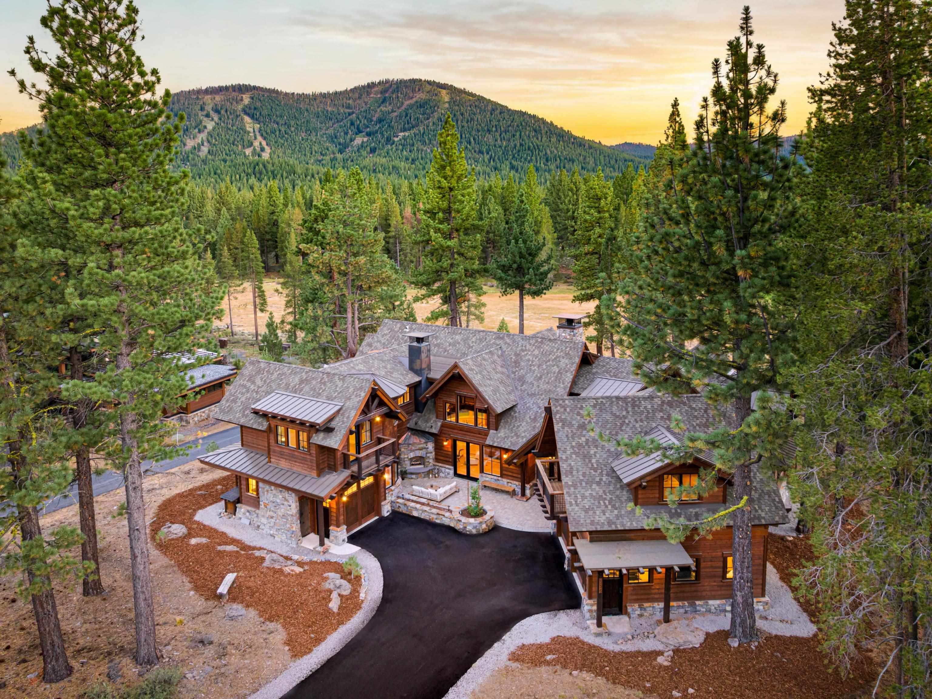 556 Stewart McKay Truckee, CA 96161 - Photo 2 of 27 an aerial view of a house with swimming pool and mountain view