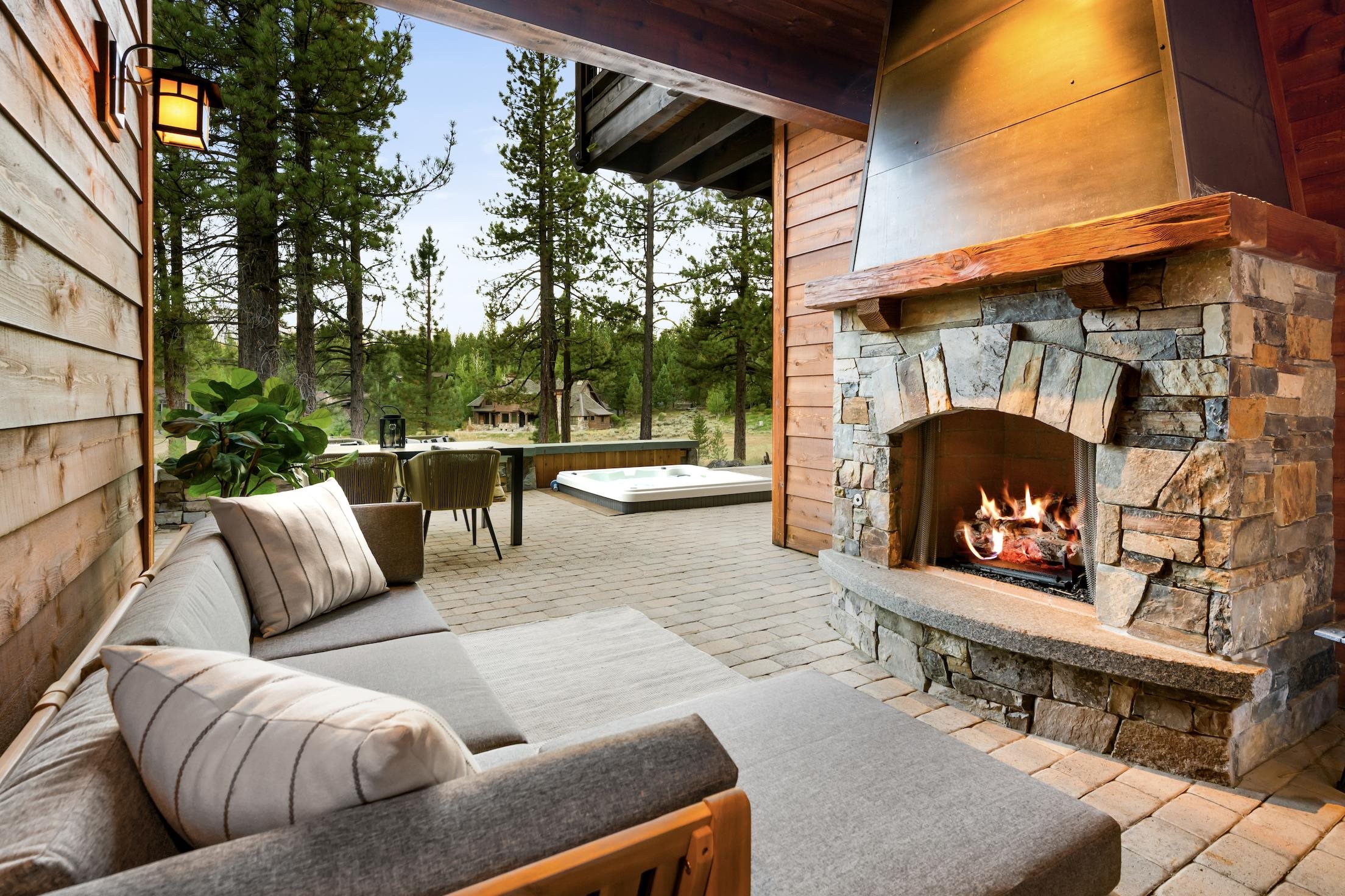 556 Stewart McKay Truckee, CA 96161 - Photo 25 of 27 a outdoor living space with furniture and a fireplace