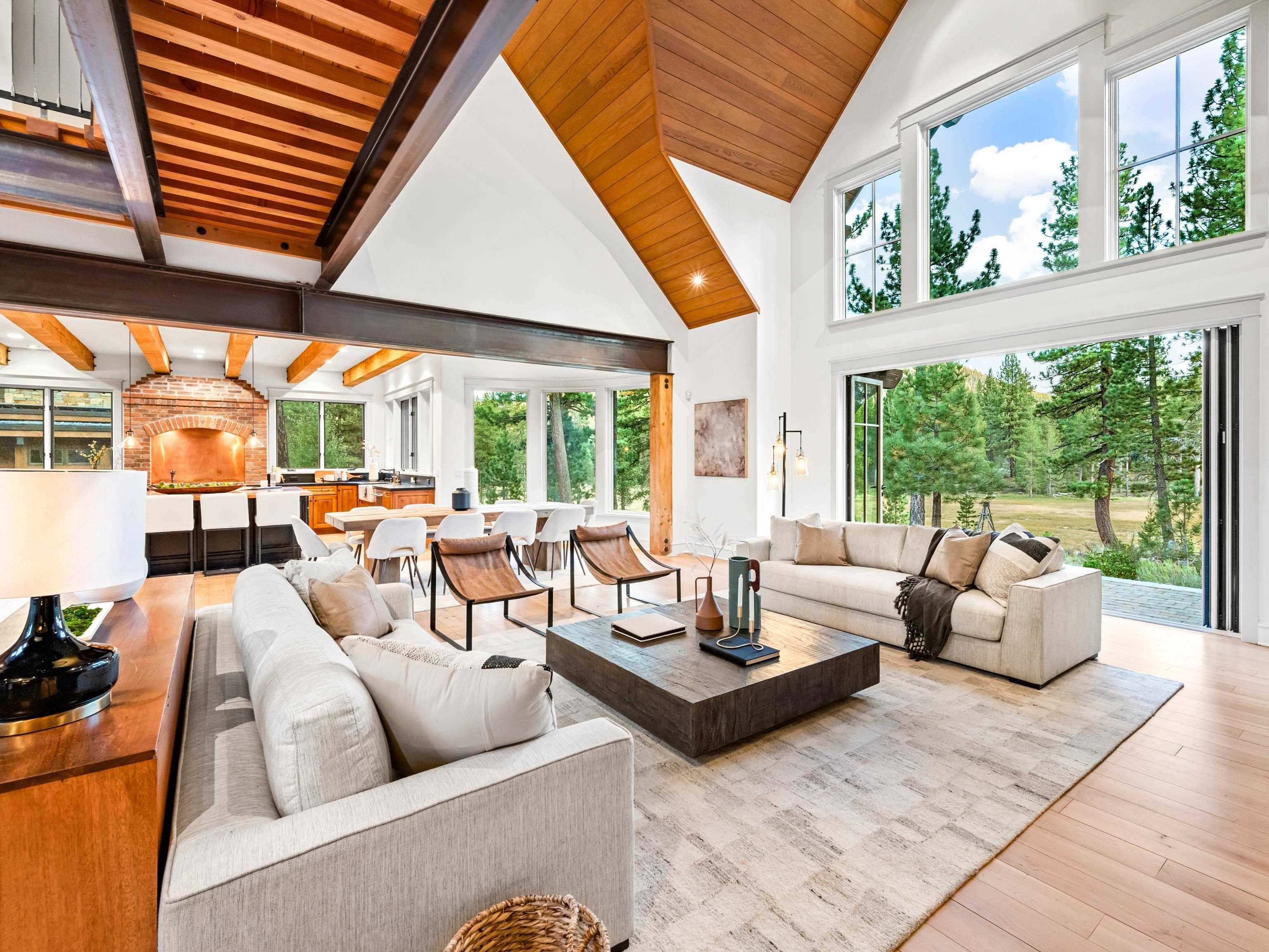 556 Stewart McKay Truckee, CA 96161 - Photo 4 of 27 a living room with patio furniture and a large window