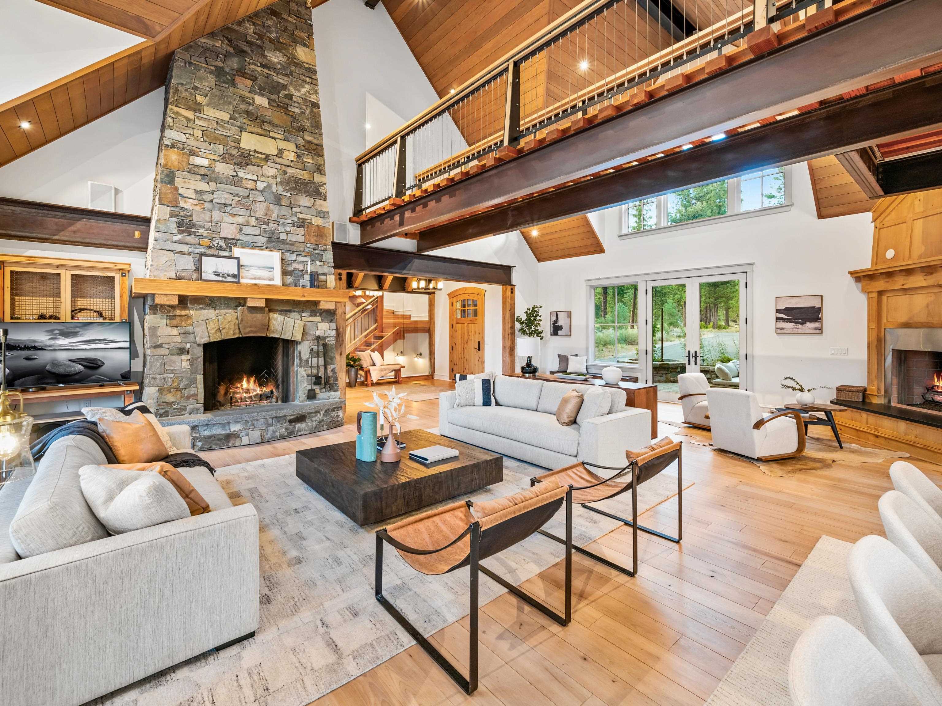 556 Stewart McKay Truckee, CA 96161 - Photo 8 of 27 a living room with furniture and a fireplace