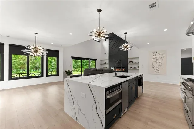 a spacious bedroom with a bed and a window