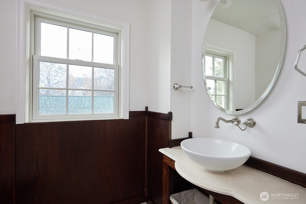 444 Washington Street Walla Walla, WA 99362 - Photo 24 of 40 a bathroom with a sink a window and a mirror