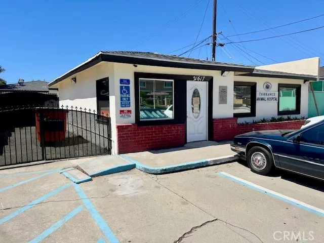 a view of a car in front of a house