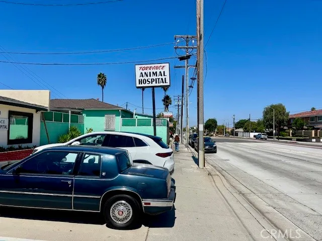 a view of a car parked in front of a building