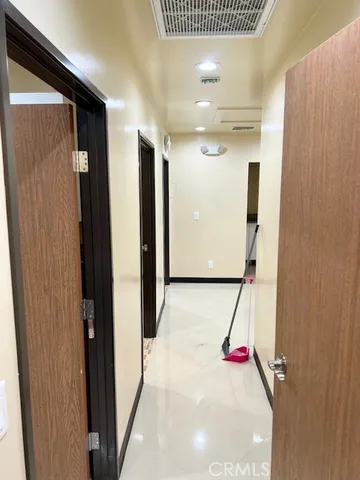 a view of a hallway with entryway