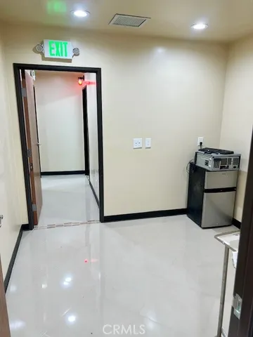 a view of a hallway with storage