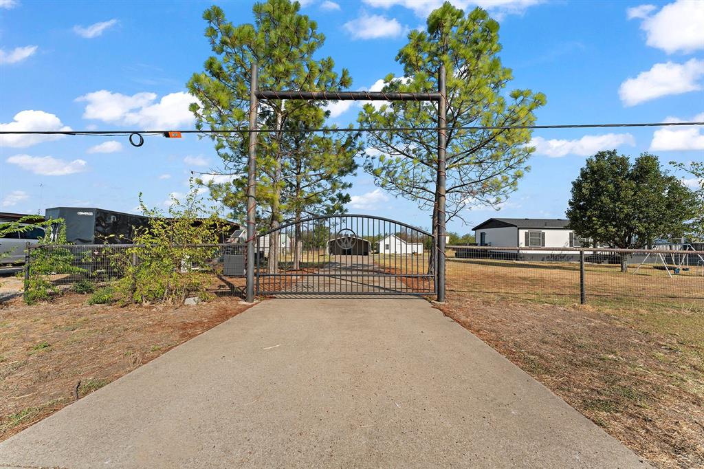 1222 Anglin Way Terrell, TX 75161 - Photo 2 of 26 nice mature pine trees.