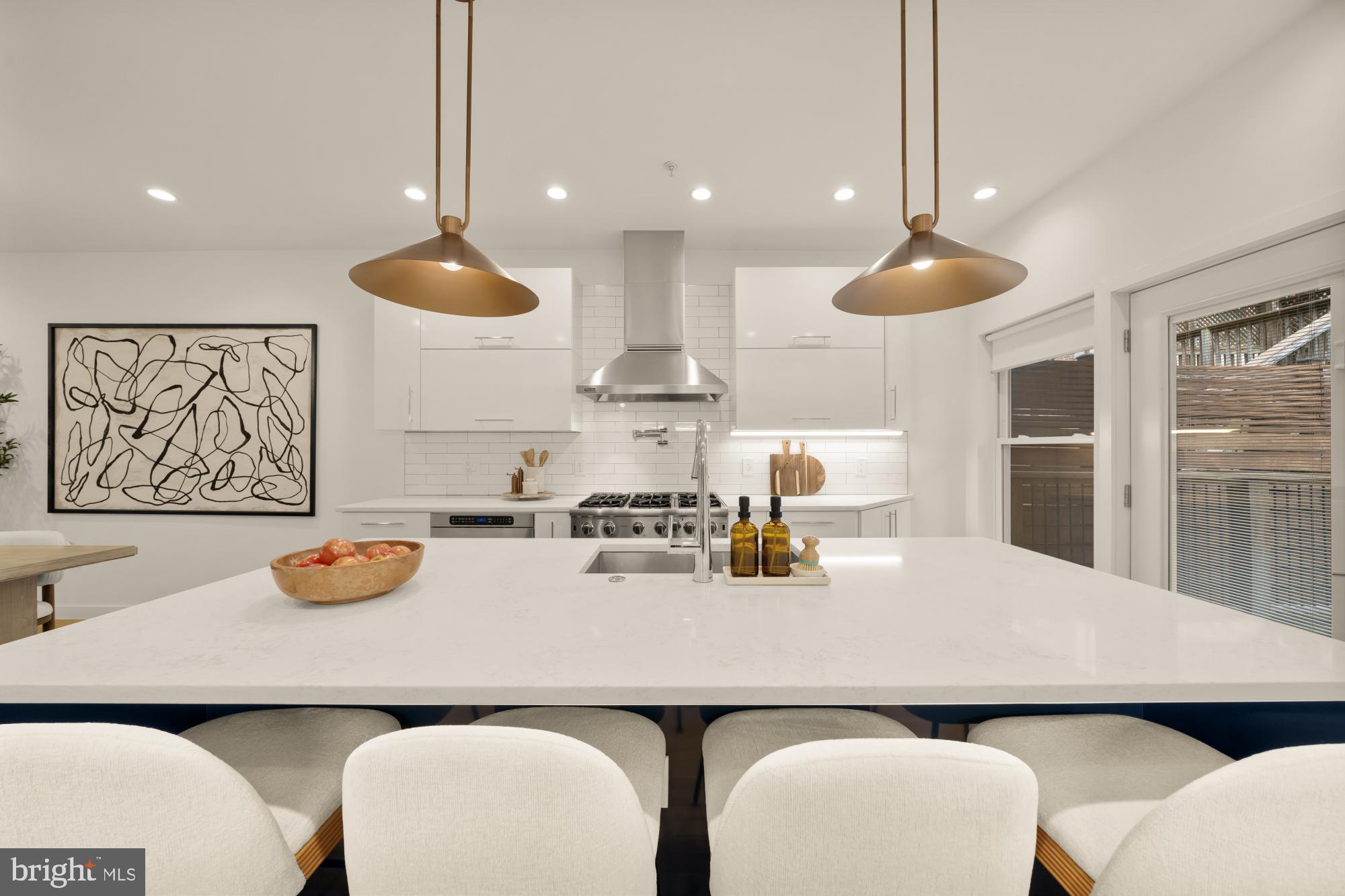 2315 Ontario Road Northwest, Unit 1 Washington, DC 20009 - Photo 16 of 46 Center Island with Seating