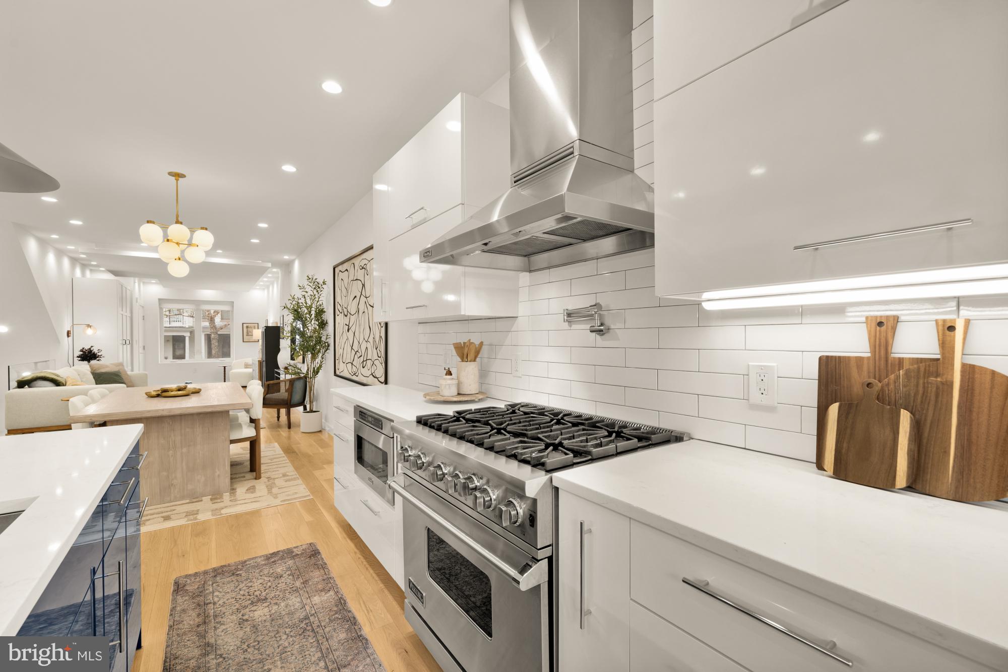 2315 Ontario Road Northwest, Unit 1 Washington, DC 20009 - Photo 20 of 46 Commercial Grade Range with Professional Hood