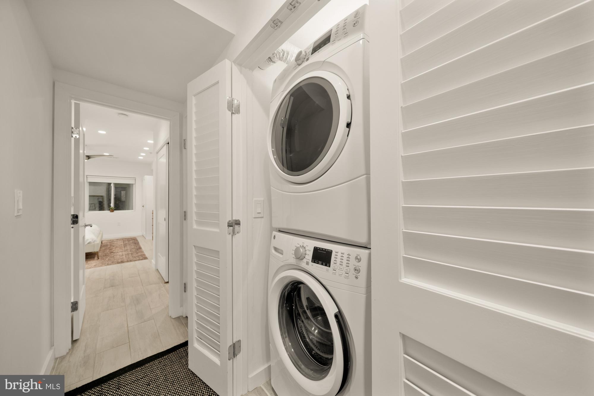 2315 Ontario Road Northwest, Unit 1 Washington, DC 20009 - Photo 27 of 46 Front-Loading Washer and Dryer next to Bedrooms