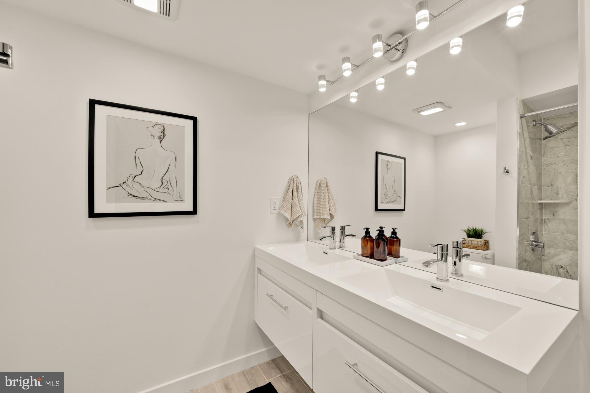 2315 Ontario Road Northwest, Unit 1 Washington, DC 20009 - Photo 37 of 46 Second Bathroom with Dual Sinks off Second Bedroom