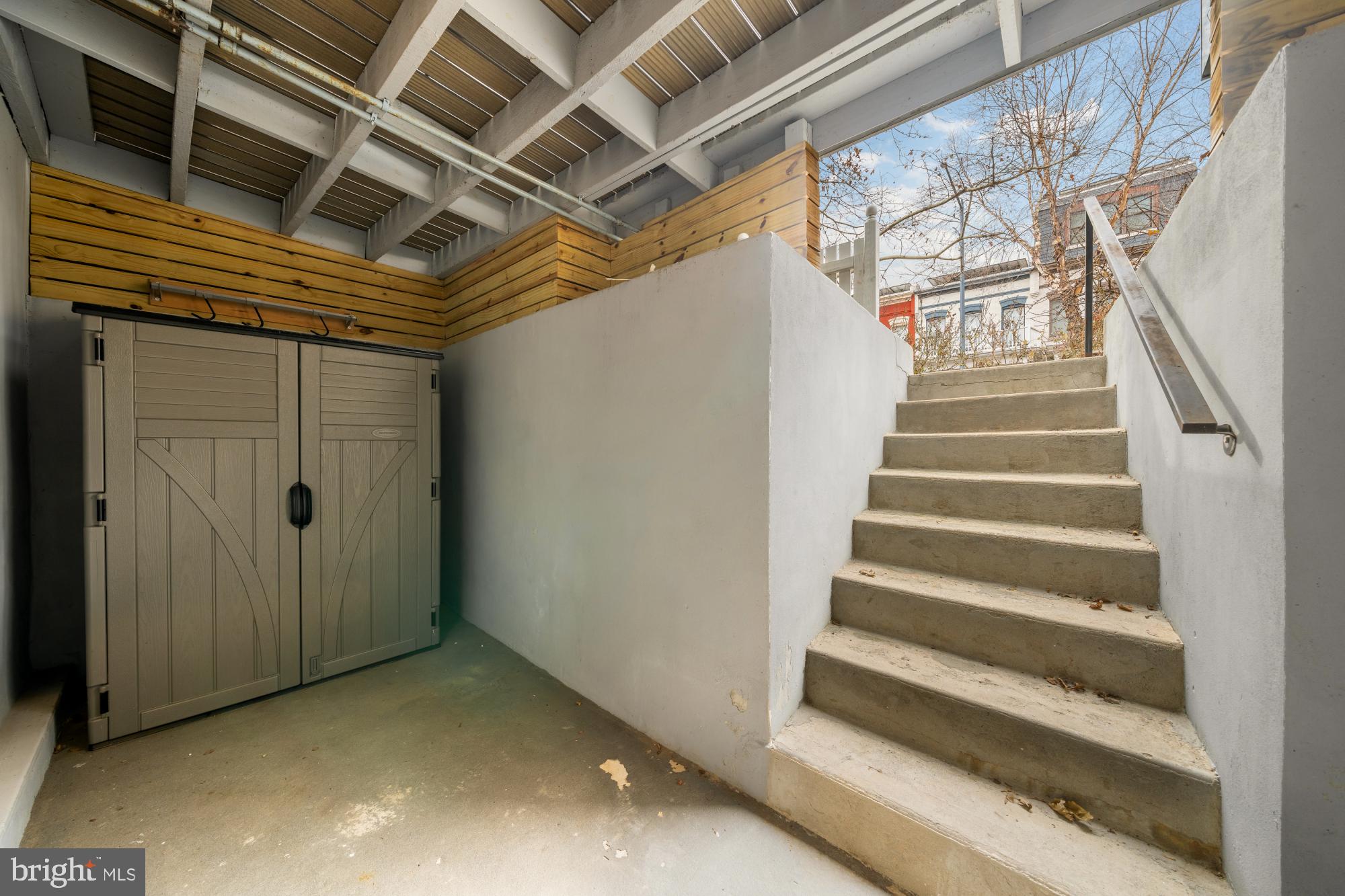2315 Ontario Road Northwest, Unit 1 Washington, DC 20009 - Photo 42 of 46 Front Private Patio with Storage