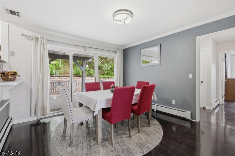 112 Knob Hill Road Hackettstown, NJ 07840 - Photo 12 of 32 a view of a dining room with furniture window and wooden floor