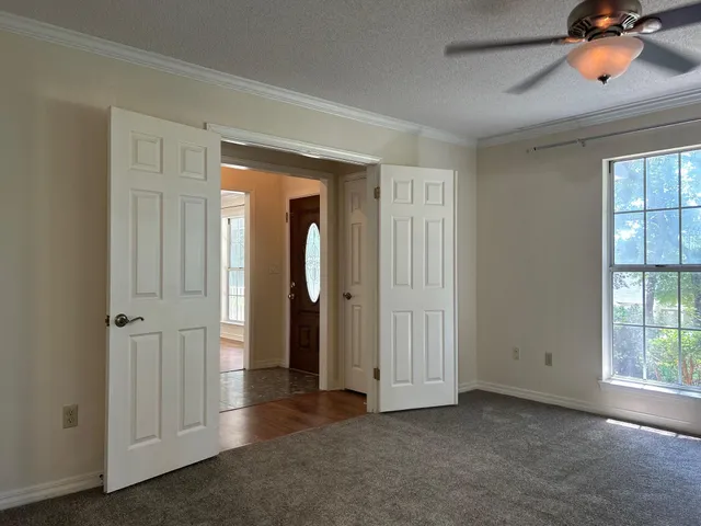a bathroom with double sink and a mirror