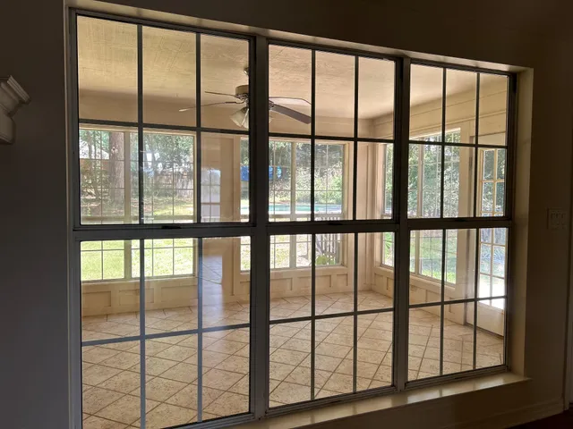 a view of an empty room with a window