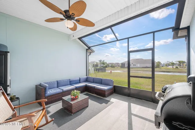 a view of a lake with houses in the back